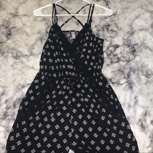 Black romper white designs